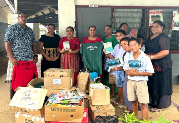 GMS Houma receiving donation from the Noble Representative Office.