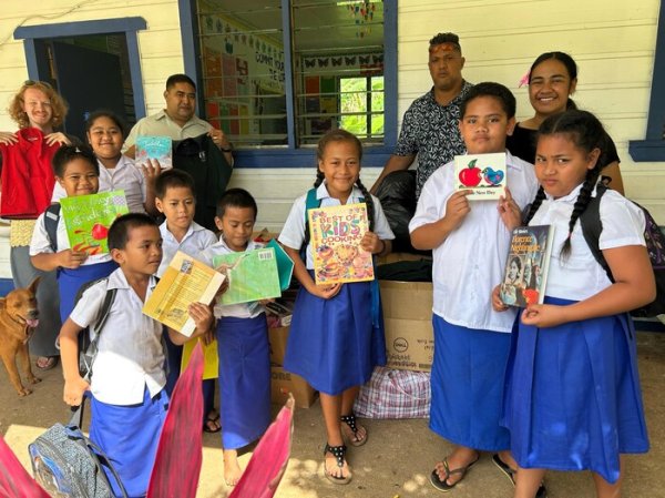 FWC School at Vaotu'u receiving donation from the Noble Representative Office.